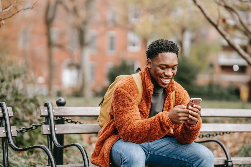 a guy pressing phone