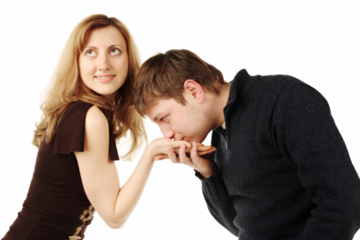 young man kissing the palm of young woman