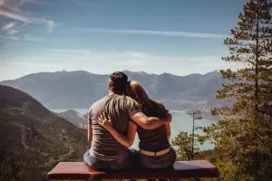 a boyfriend and girlfriend sitting