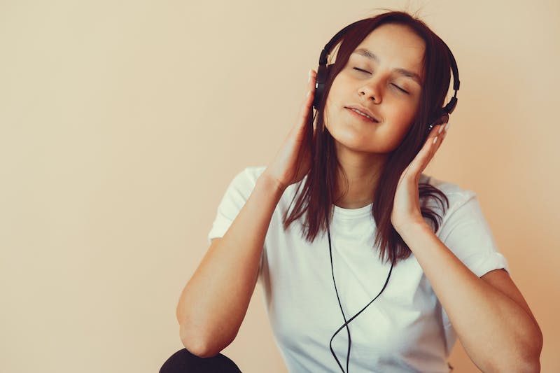 a teenager playing music